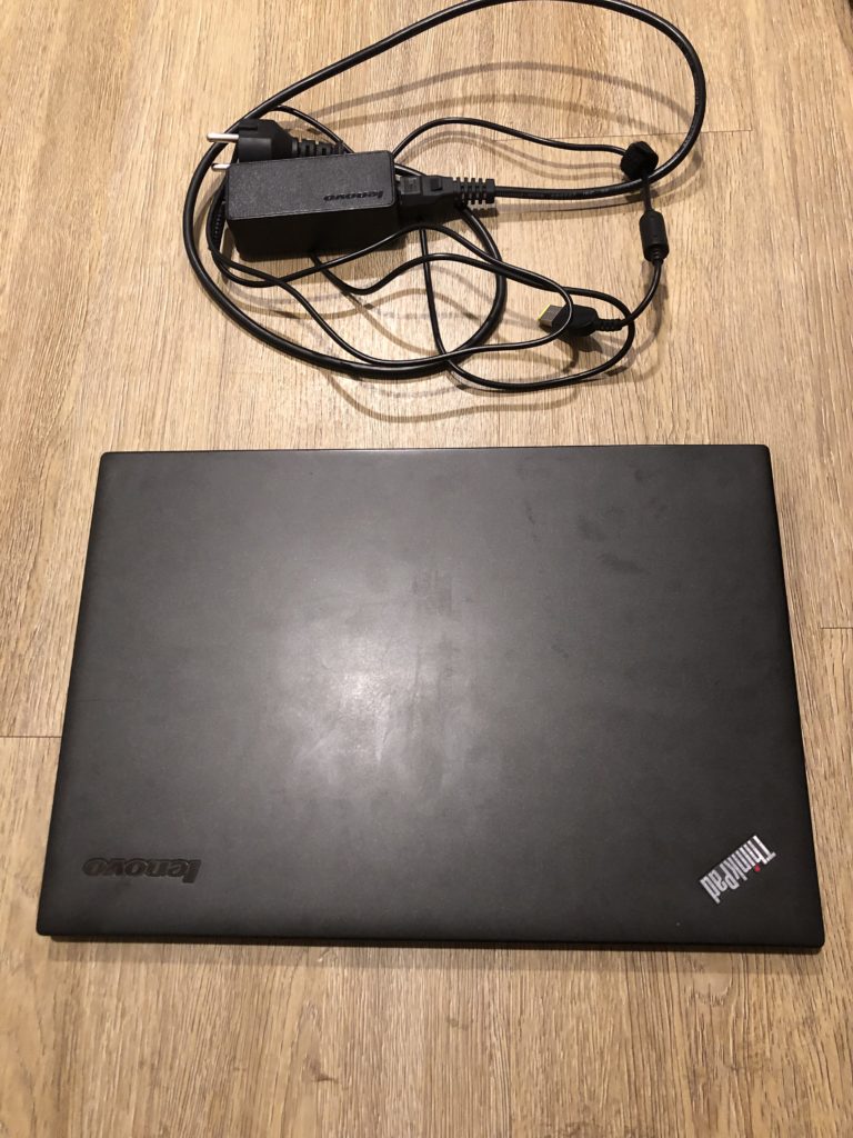 Lenovo X1 Carbon 2nd Generation laptop and charger.