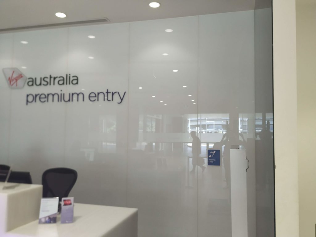 Virgin Australia Brisbane domestic lounge premium entry - front desk.