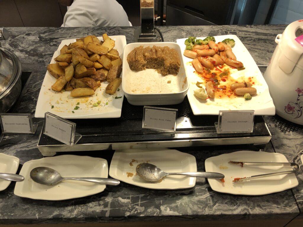 Hot food selection at Plaza Premium lounge.