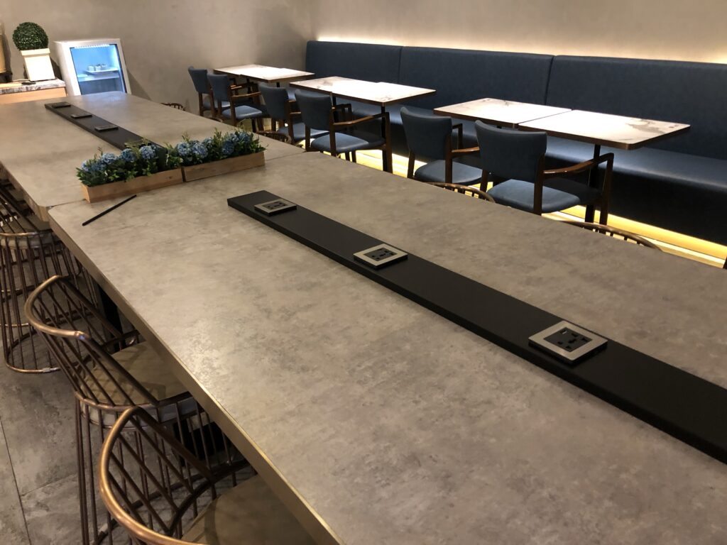 Some alternate seating in the dining area of the lounge, with power points for those who want to work.